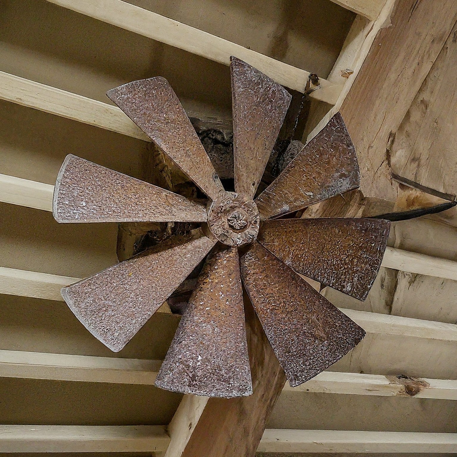 an image depicting a faulty attic fan which is not in a working condition