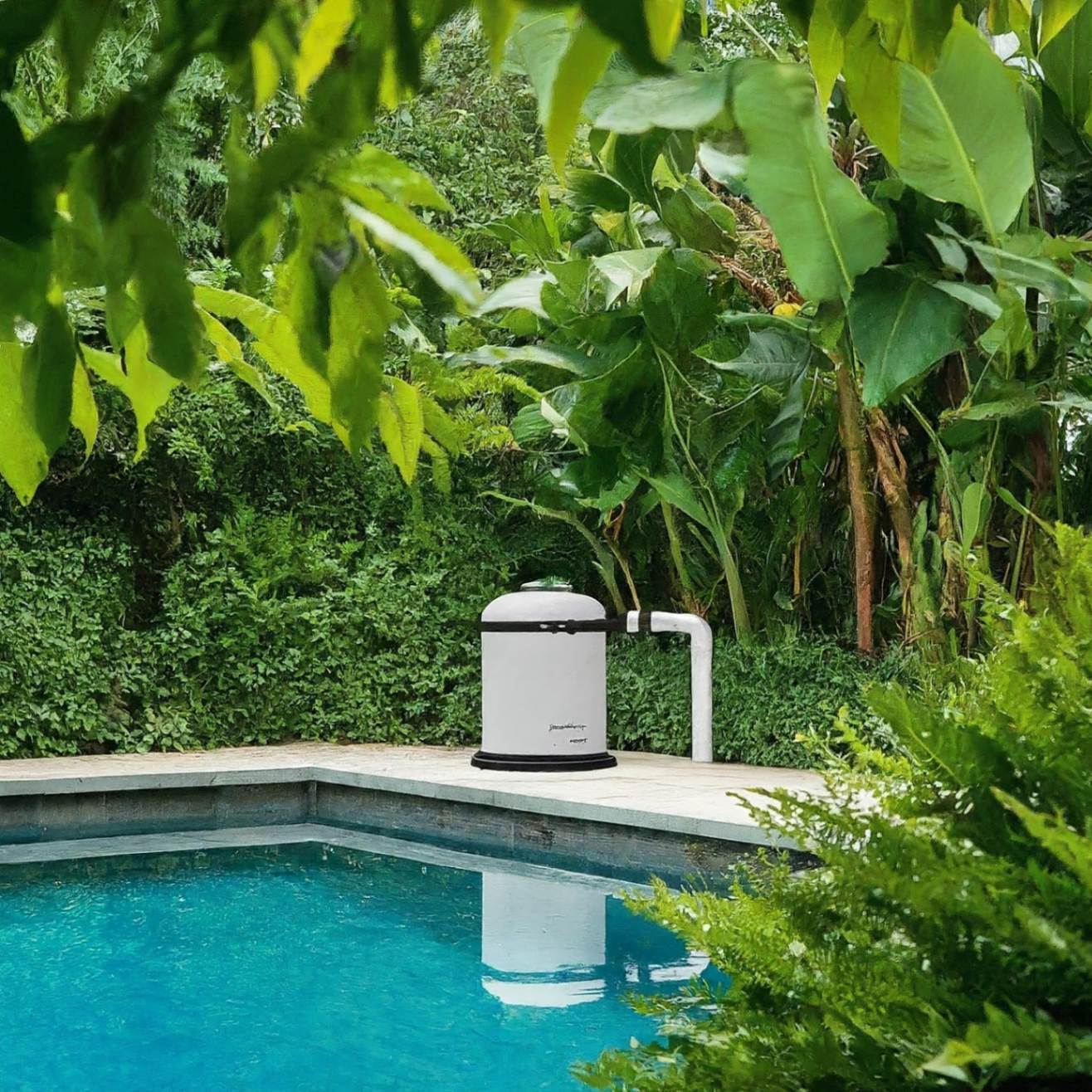 an image of a pool pump installed near a swimming pool