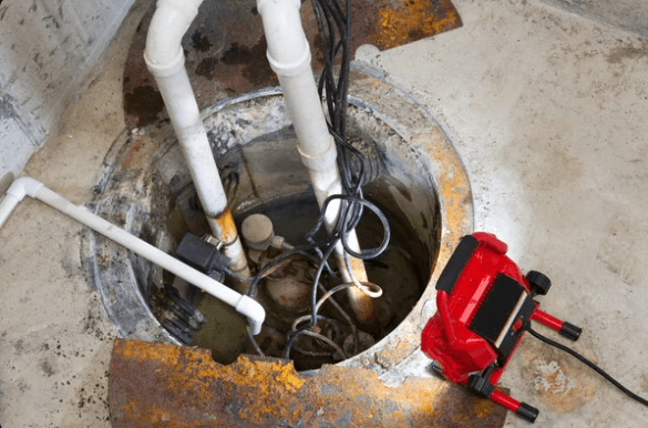an image displaying a malfunctioning sump pump being repaired.
